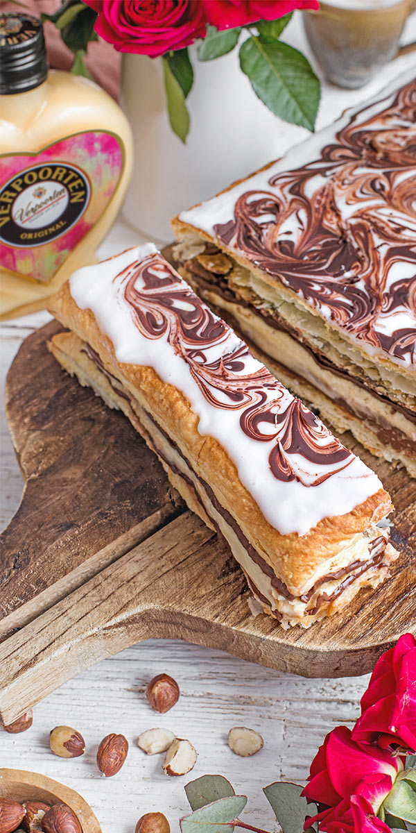 Nuss-Nougat-Knusper-Schnitten mit Eierlikörcreme Bild 1 Nuss-Nougat-Knusper-Schnitten mit Eierlikörcreme Bild 1